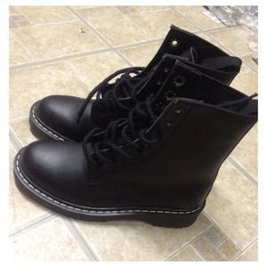 Black Doc Martens look a like boots.