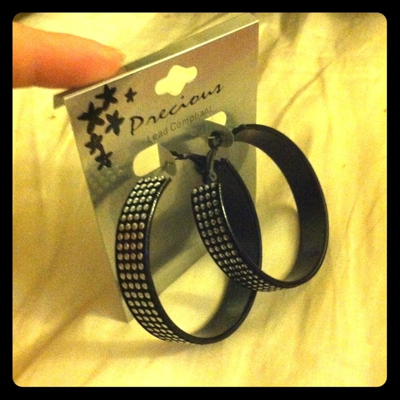 Black studded hoop earrings.