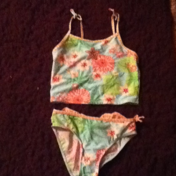 Two piece, sea foam green swimming suit.