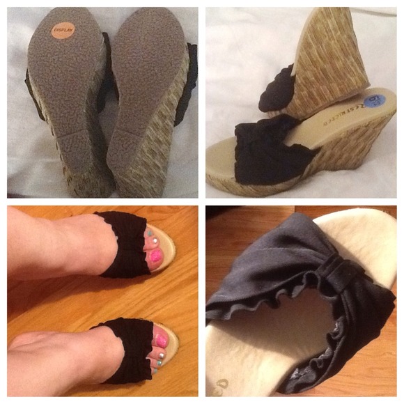 Four inch black wedge heal