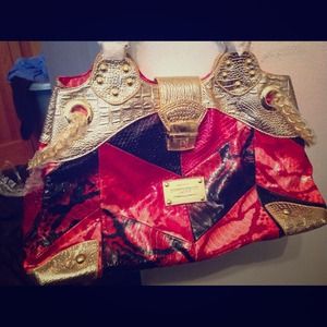 Red and gold hand bag.new with tags.