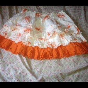 A orange and white skirt.