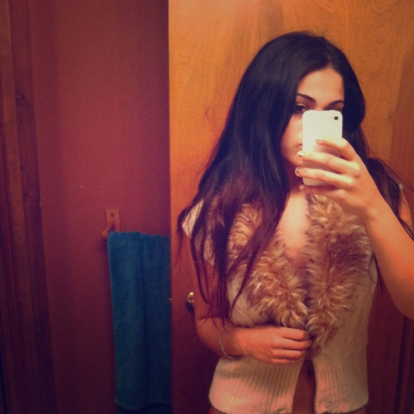 Never worn sweater vest with faux fur collar