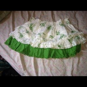 A green ad white skirt.