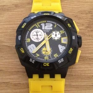 2 watches (Yellow and Orange Swatch watch)