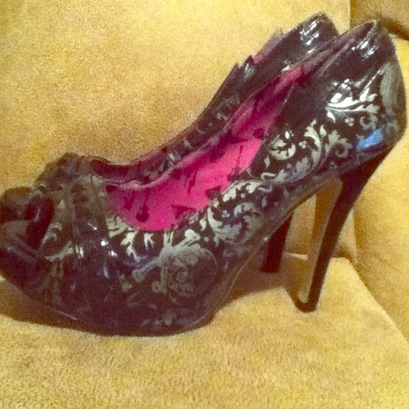 Iron fist peep toe heels