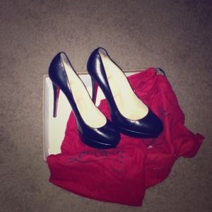 Black  Authentic Christian Louboutin Sold