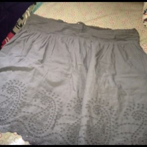 A beautiful grey skirt.