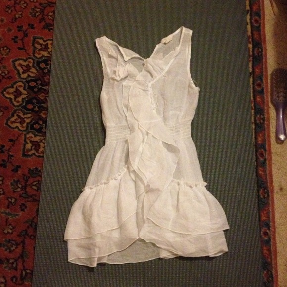 Long white shirt with ruffles