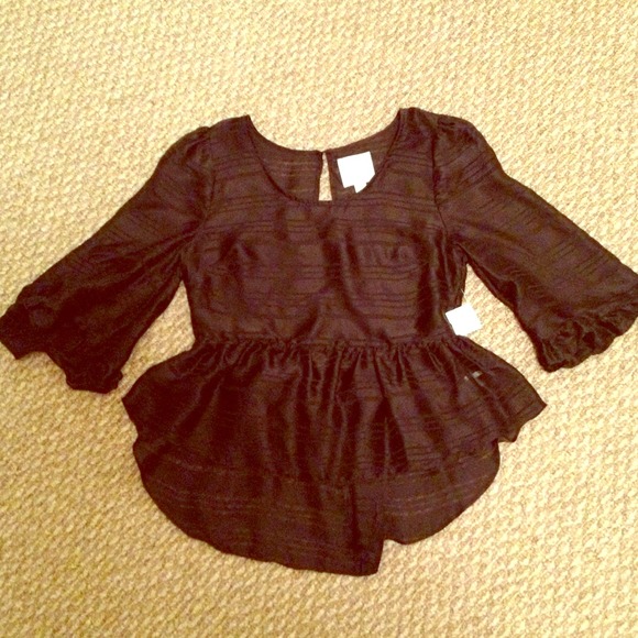 Hi-lo peplum top with open back