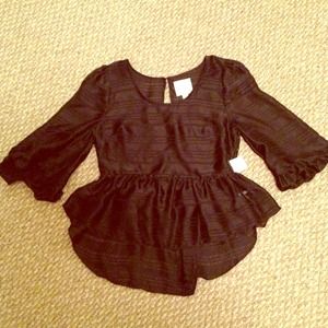 Hi-lo peplum top with open back