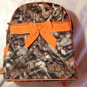 Mossy oak style camo backpack with orange ribbon