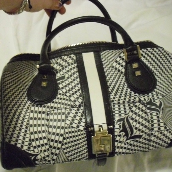 L.A.M.B. bowler... One of my fav bags ever!