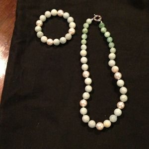 Green and silver beaded necklace and bracelet.