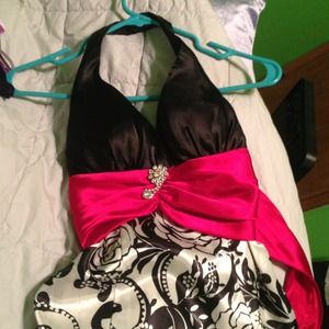 Black and white halter dress with red ribbon waist