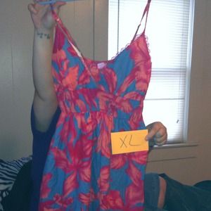 Two dresses and a necklace