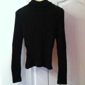 Black shimmery turtleneck vented sweater