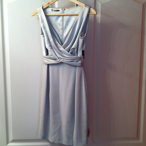 Pale green dress with slit on left leg