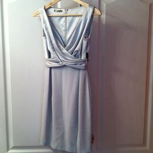 Pale green dress with slit on left leg