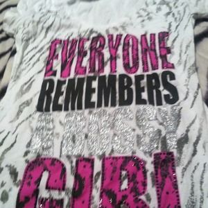 A glitter zebra shirt with slits on the sleeve