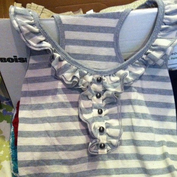 Get and cream long and lean razorback tank!