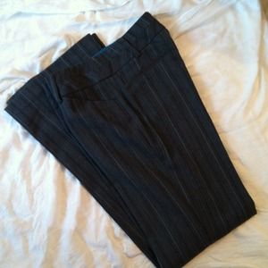 Black, gray, and turquoise dress pants