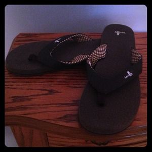 Brown Sanuk flip flops