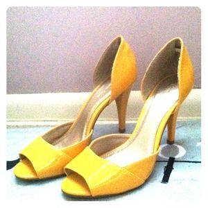 Light mustard yellow colored high heel