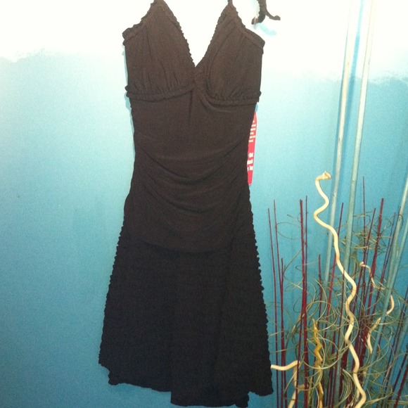 Sassy, playful black dress with ruching