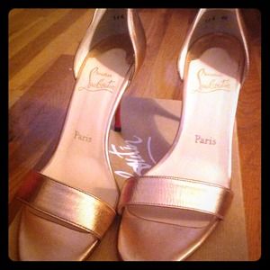 Never worn Christian  louboutin shoes .