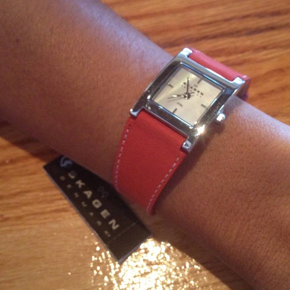 Red genuine leather watch w/mother of pearl face