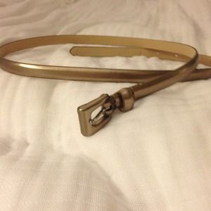 Goldish/bronze skinny metallic belt