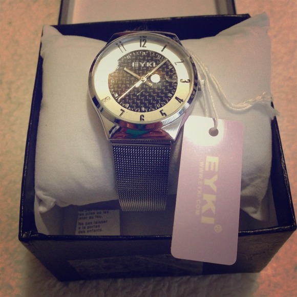 NWT stainless steal watch with carbon fiber inside