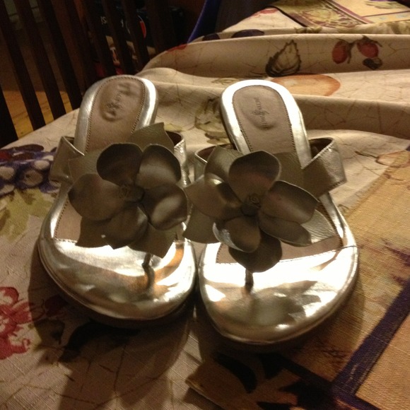 Silver flower sandles.