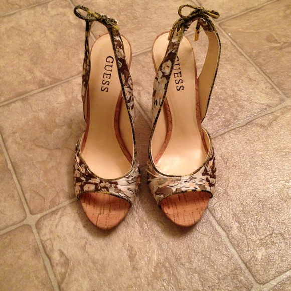 On hold...💯% Authentic ladies Guess summer heels.