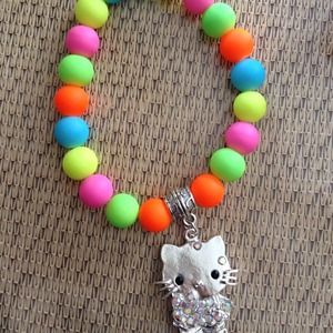 Neon color bracelet with hello kitty pendant!
