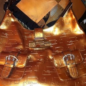 Authentic Gold guess handbag