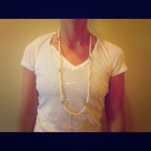 Necklace with Ivory beads and green jewels