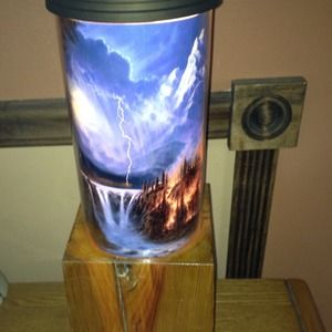 Handmade light on treated wood spins any theme