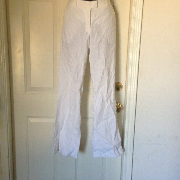 99% White linen trousers with gold subtle gold stripes