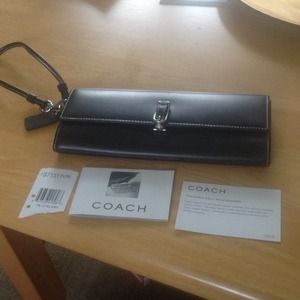 Coach wrist clutch ..