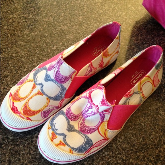 Authentic coach slip ons.