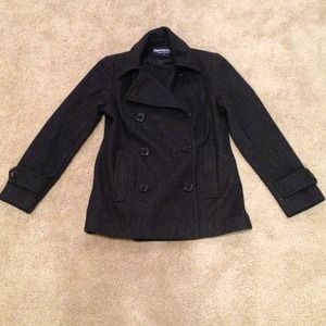 Dark grey button up coat.