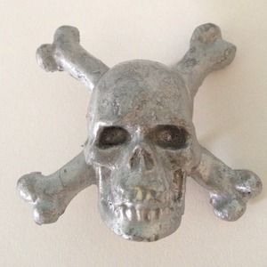 Silver skull and crossbones pin