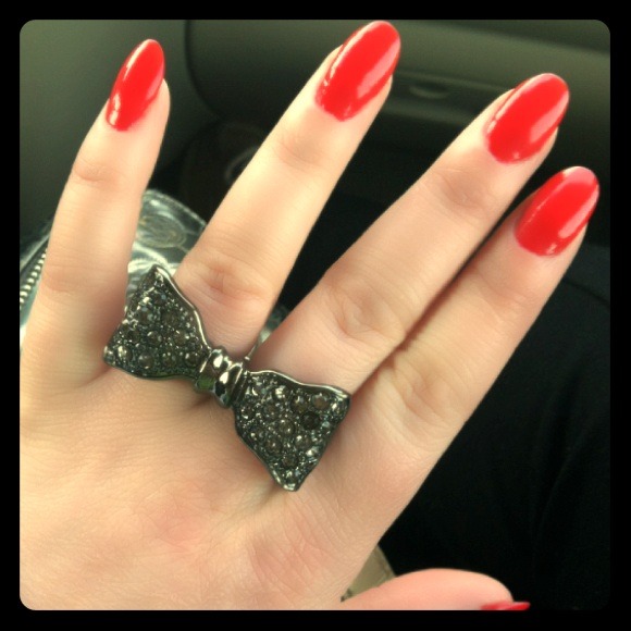 Sparkly multi finger bow ring