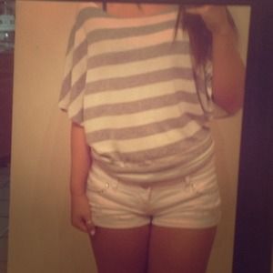 Over sized white gray shirt, with opening in back.