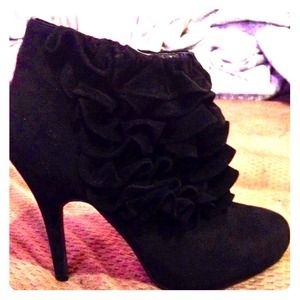 Black heel ankle booties.