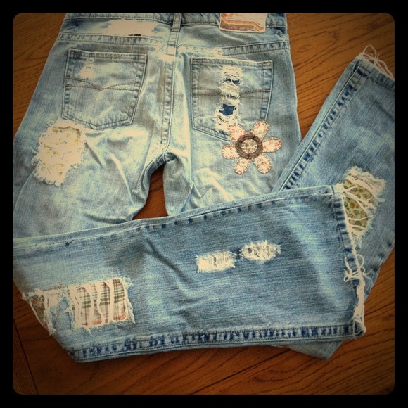 Aged jeans with patchwork