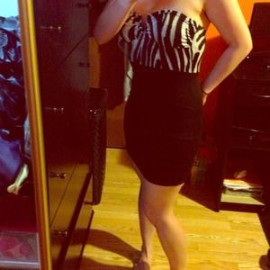 Animal print dress with cleavage opening