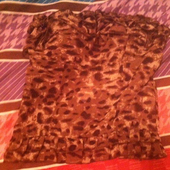 A leopard print sleeveless shirt